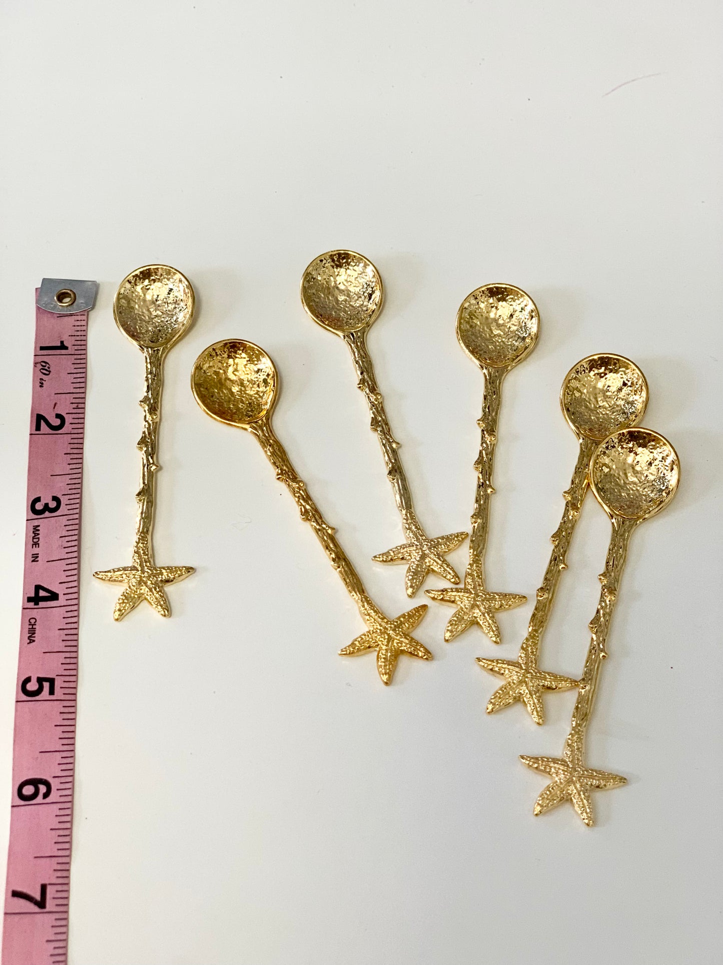 One Gold Spoon with star fish